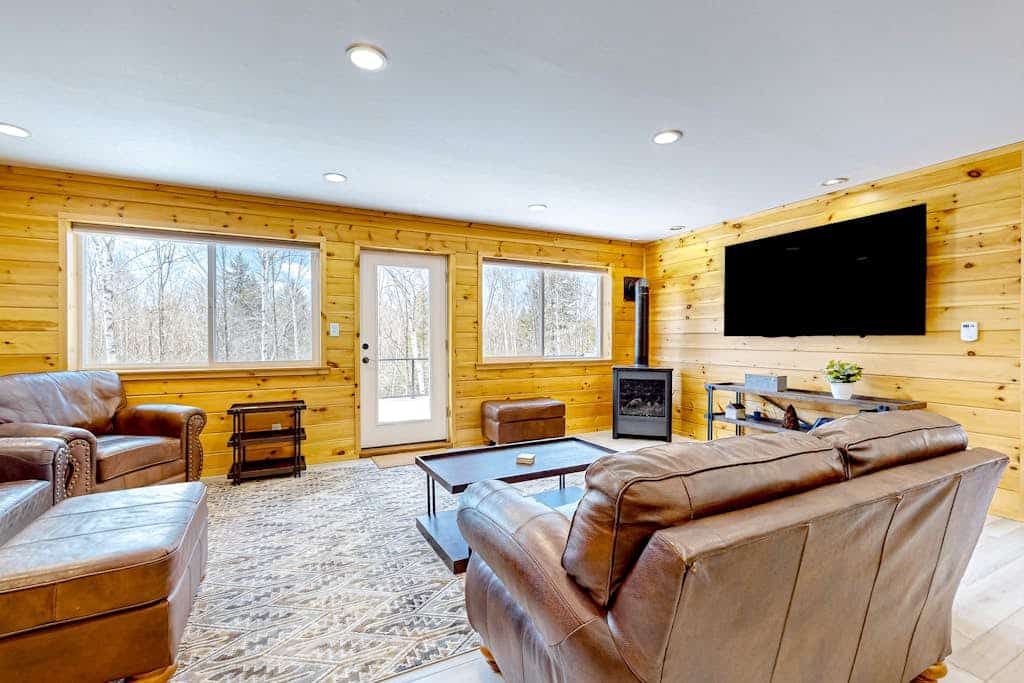 Dog-friendly apartment by Moosehead Lake with sprawling deck & firepit