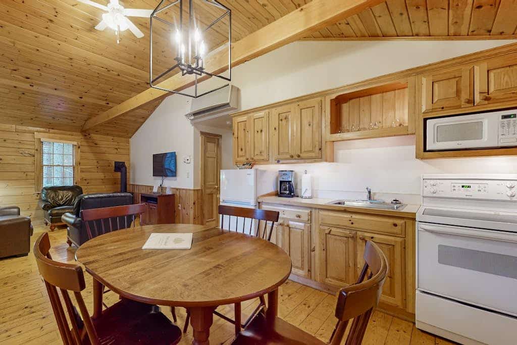 Comfortable two bedroom cabin with firepit, kitchen, hiking trail within walking