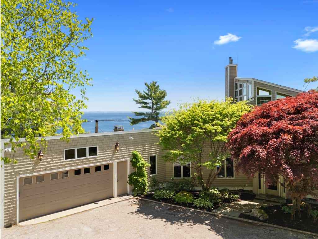 Elegant ocean view home with breathtaking views, private hot tub & large deck