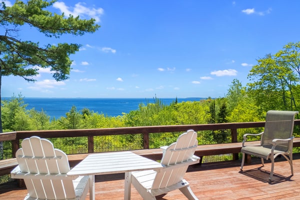 Elegant ocean view home with breathtaking views, private hot tub & large deck
