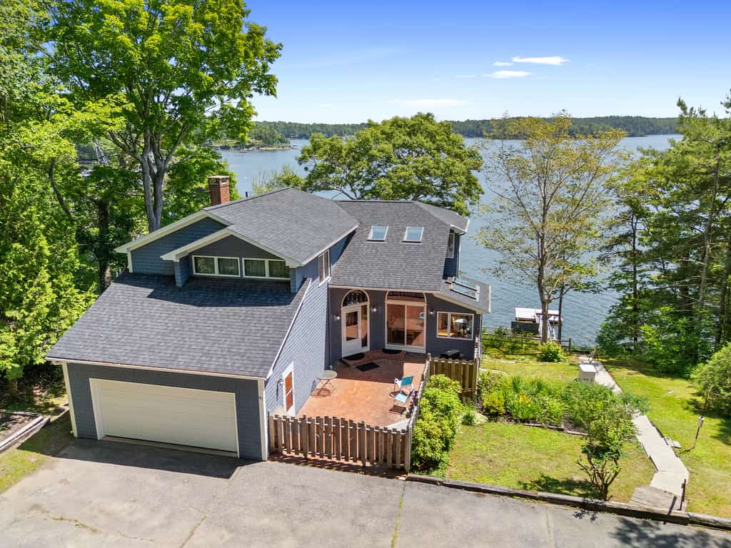 High View- Serene waterfront home w/ a dock, large deck & amazing views!