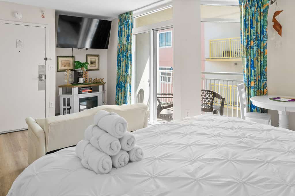 Your search for the perfect vacation spot ends here! This cozy, partial ocean-view king suite is tucked inside the beloved Bay Watch Resort in North Myrtle Beach, SC. Ideal for couples or small families, the condo is fully furnished with a plush king-sized bed and a comfy full-sized sleeper sofa, comfortably sleeping up to four guests.