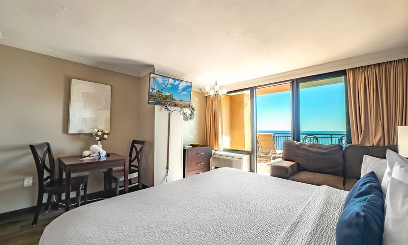 Welcome to 513 Caravelle Resort in Myrtle Beach, SC. This oceanfront studio is home to one of the largest private balconies in Myrtle Beach, and we truly mean it. Located on the 5th floor, this studio features an incredible 300 square foot balcony that offers endless, panoramic views of the Atlantic Ocean. To put it into perspective, the balcony is nearly as large as the condo itself. Having your own private terrace with comfortable outdoor furniture makes this beachside escape truly special and provides the perfect setting to relax, dine, or enjoy the ocean breeze.