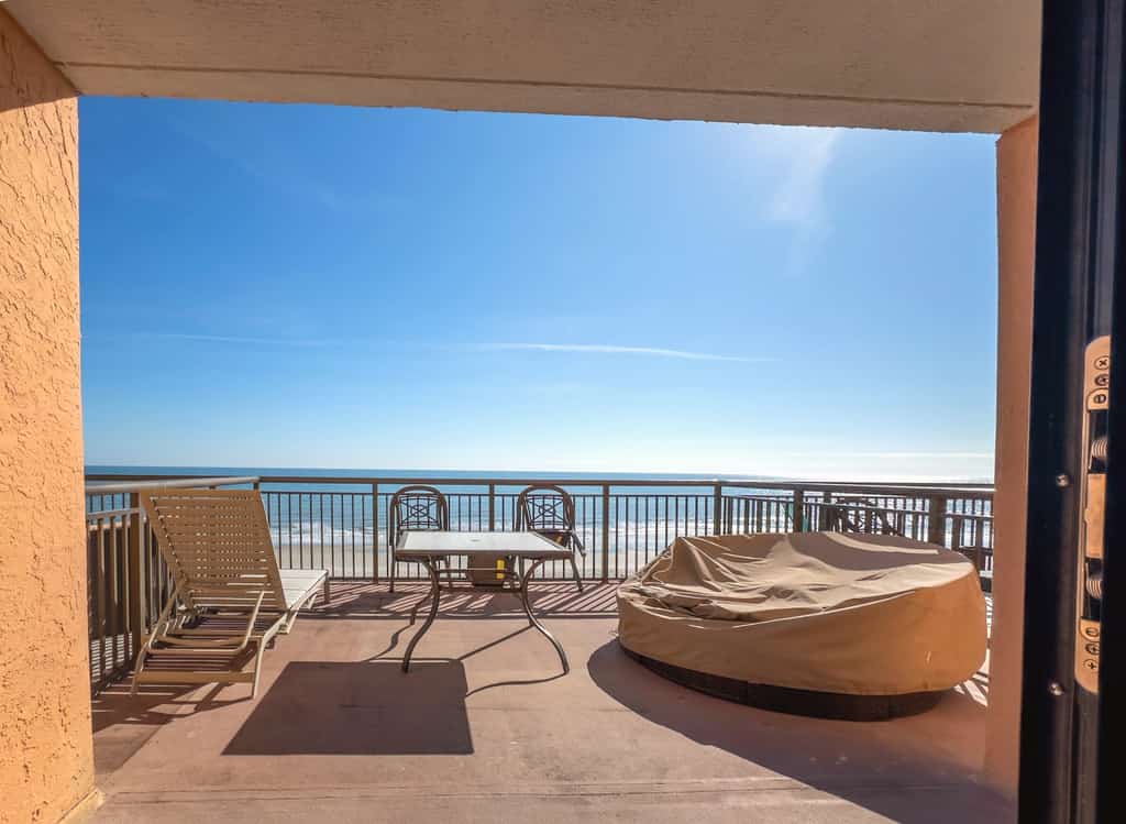 Welcome to 513 Caravelle Resort in Myrtle Beach, SC. This oceanfront studio is home to one of the largest private balconies in Myrtle Beach, and we truly mean it. Located on the 5th floor, this studio features an incredible 300 square foot balcony that offers endless, panoramic views of the Atlantic Ocean. To put it into perspective, the balcony is nearly as large as the condo itself. Having your own private terrace with comfortable outdoor furniture makes this beachside escape truly special and provides the perfect setting to relax, dine, or enjoy the ocean breeze.