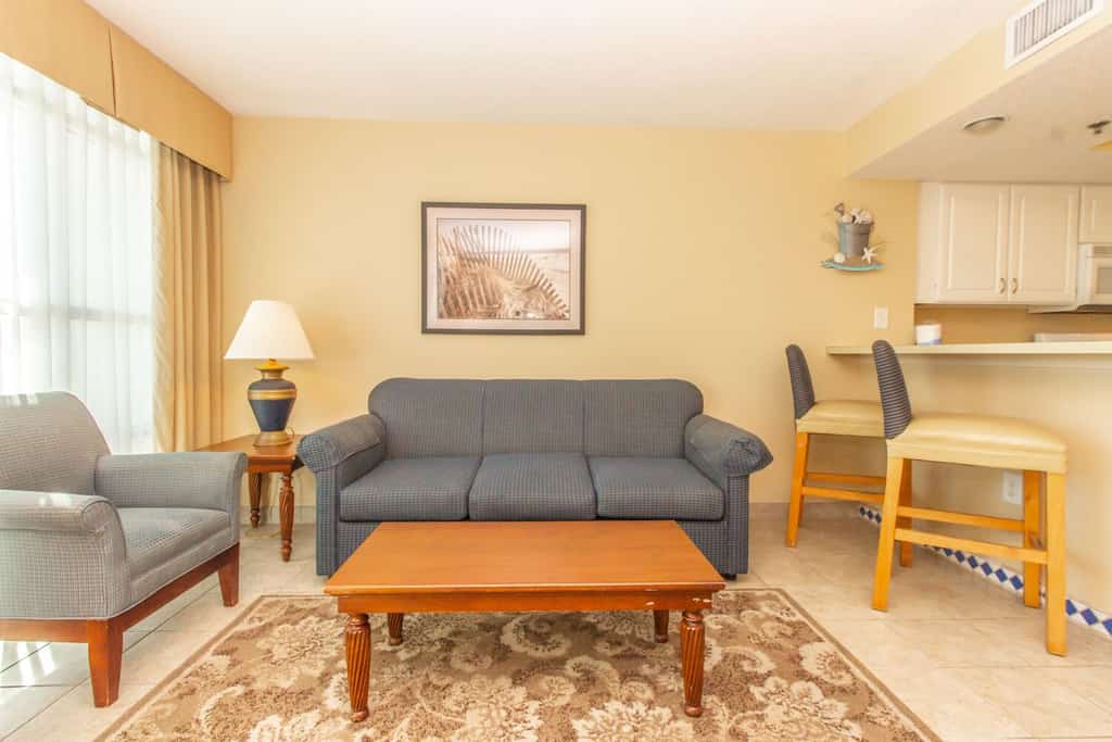 Check out this homey 1 bedroom oceanfront condo, tucked away on the 7th floor of the Carolinian Resort. It's furnished with two full-sized beds and a sleeper sofa, so it can comfortably sleep up to six guests, making it a great spot for a family vacation or a beachy escape with friends.