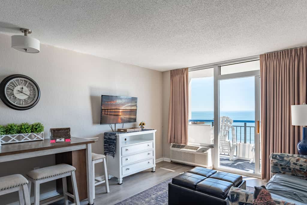 Check out this direct oceanfront vacation rental at Boardwalk Resort in Myrtle Beach, SC. This oceanfront vacation rental is fully furnished with everything you need for your next vacation. This apartment features 2 full sized beds, 1 murphy bed, 1 sleeper sofa, and will comfortably accommodate 8 guests. This rental is a true 1-bedroom condo, and our guests enjoy the separation between rooms and the privacy that is offered. The bedroom area features 2 full sized beds, nightstand, dresser for storage, and TV with basic cable.