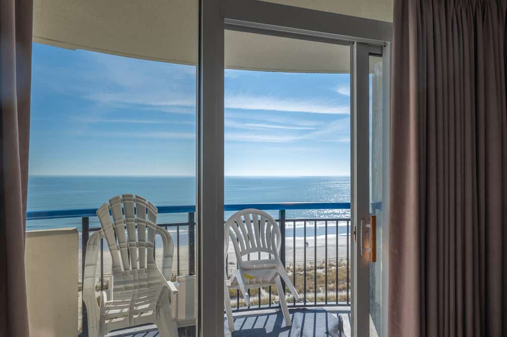 Check out this direct oceanfront vacation rental at Boardwalk Resort in Myrtle Beach, SC. This oceanfront vacation rental is fully furnished with everything you need for your next vacation. This apartment features 2 full sized beds, 1 murphy bed, 1 sleeper sofa, and will comfortably accommodate 8 guests. This rental is a true 1-bedroom condo, and our guests enjoy the separation between rooms and the privacy that is offered. The bedroom area features 2 full sized beds, nightstand, dresser for storage, and TV with basic cable.