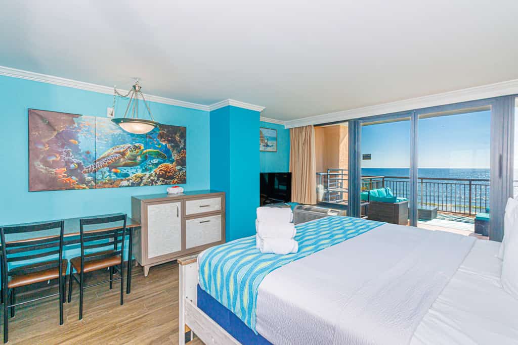 Located at the iconic Caravelle Resort in the heart of Myrtle Beach, this stunning oceanfront condo offers the perfect blend of comfort, style, and those unforgettable coastal views you&rsquo;ve been dreaming about. Step inside and let the sound of the waves instantly melt your worries away. The moment you walk out onto your private balcony, you&rsquo;ll understand why this condo is so special, this balcony is massive, nearly triple the size of most others in the resort! Whether you&rsquo;re soaking up the sun with a good book, enjoying a romantic sunset dinner, or simply listening to the rhythmic sounds of the ocean, this outdoor space is pure bliss.