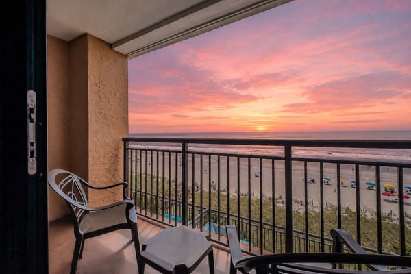 Enjoy breathtaking oceanfront views at the Caravelle Resort in Myrtle Beach! This fully updated 6th-floor King-suite features fresh paint, new flooring, brand-new mattresses, updated furniture, a new TV, modern appliances, and more. The private entrance offers added convenience and privacy, making it feel like a home away from home. With all the comforts of a hotel room but more spacious, this oceanfront retreat is perfect for your next beach getaway!