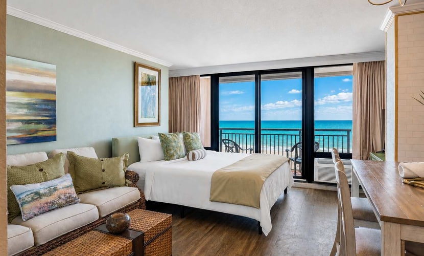 Enjoy breathtaking oceanfront views at the Caravelle Resort in Myrtle Beach! This fully updated 6th-floor King-suite features fresh paint, new flooring, brand-new mattresses, updated furniture, a new TV, modern appliances, and more. The private entrance offers added convenience and privacy, making it feel like a home away from home. With all the comforts of a hotel room but more spacious, this oceanfront retreat is perfect for your next beach getaway!