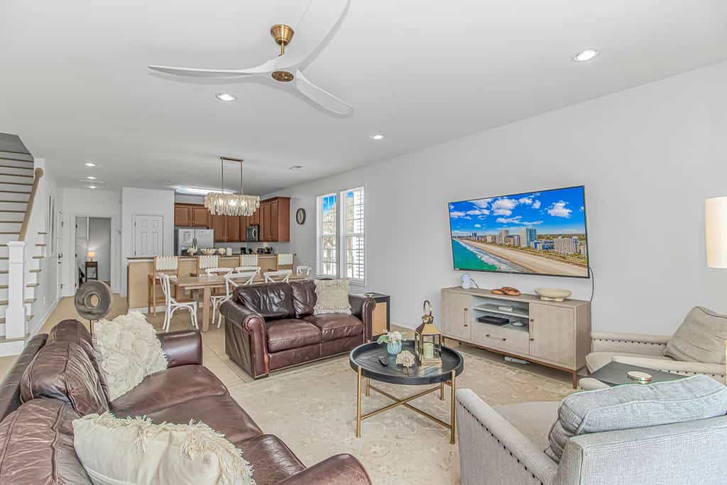 Welcome to Changes In Attitude, a beautiful five-bedroom, three-and-a-half-bath coastal retreat located in Surfside Beach. True to its name, this relaxing beach home is the perfect place to leave your worries behind and embrace vacation mode. With plenty of room for family and friends, the home comfortably accommodates up to 11 guests, making it ideal for group getaways, family vacations, or beach celebrations. Dogs are welcome so your furry family members can join the adventure, though we kindly ask that pets weigh 50 pounds or less. Please note that cats are not permitted. The home features updated bedrooms and a newly renovated patio, offering comfortable spaces to relax after a day at the beach. Whether you're gathering together, enjoying the fresh coastal air outside, or simply unwinding with loved ones, Changes In Attitude is designed to help you create lasting vacation memories.