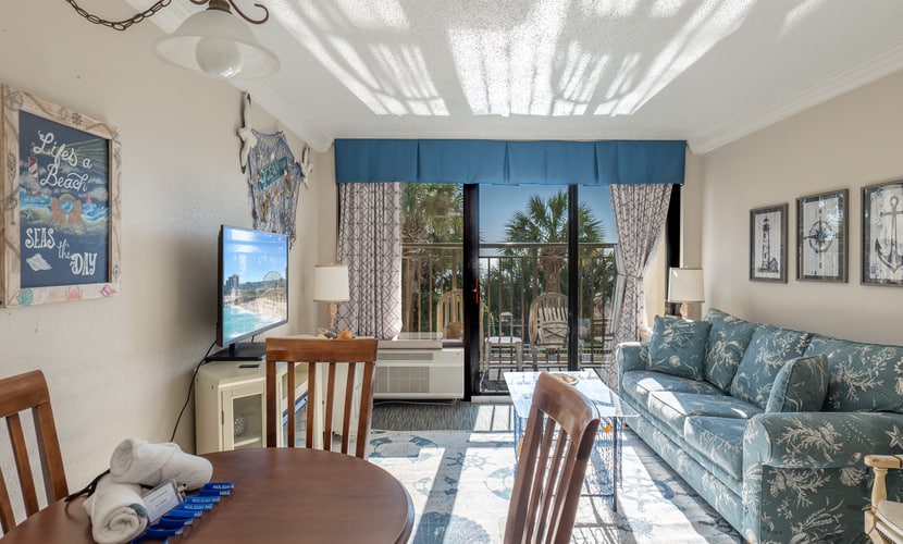 Location, Location, Location! Welcome to your perfect Myrtle Beach getaway! This stunning, direct oceanfront 1-bedroom condo is perched on a high floor of the highly sought-after Holiday Pavilion Resort, located right along the iconic Myrtle Beach Boardwalk. This unbeatable location places you just steps from the SkyWheel, 14th Avenue Pier, and a wide variety of restaurants, attractions, and entertainment.