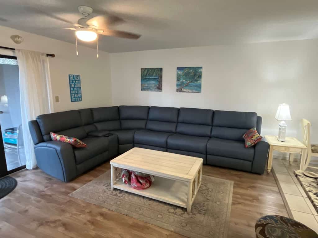 Check out this 2 bedroom, 2 bath rental located at Golf Colony behind Plantation Resort! This hidden gem sits on the ground level, making access a breeze. No stairs and no elevators! Located in the South Myrtle Beach / Surfside area, this location offers a break from the tourists and traffic but is only 10 minutes to downtown Myrtle Beach, and only 2 miles to the ocean. Have a large group? Rent this unit AND another just a block away.

As of Fall 2021, we have made a few updates to the property! The living room carpet has been removed and new laminate flooring has been installed. We have also updated the kitchen cabinets and installed new granite countertops. These updates have really made a huge difference, and our guests seem to appreciate these renovations!

This property will accommodate 6 guests comfortably and consists of approximately 800 sq ft. of living space. Once inside the apartment, guests will find a queen bed in the first bedroom on the left. This room does have a closet for storage, TV, and nightstand.

Minimum Night Stay Requirement: 7 night minimum stay required per the HOA

All guests should park in the overflow parking lots. We have included a photo of the parking map in the listing.