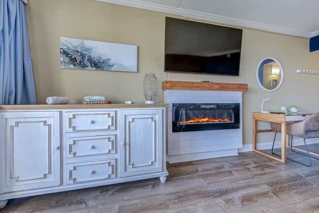 Welcome to this stunning Oceanfront King Studio at Grand Cayman Resort, where relaxation and breathtaking views are just steps away. This beautifully remodeled studio invites you to unwind and enjoy the best of beachfront living, with a king-sized bed, a cozy sleeper sofa, and enough space to comfortably accommodate up to four guests. From your private patio, take in the serene beauty of the sunrise over the ocean each morning. Located on the first floor, you&rsquo;ll have the convenience of no stairs or elevators, just walk right in and begin your vacation without delay.