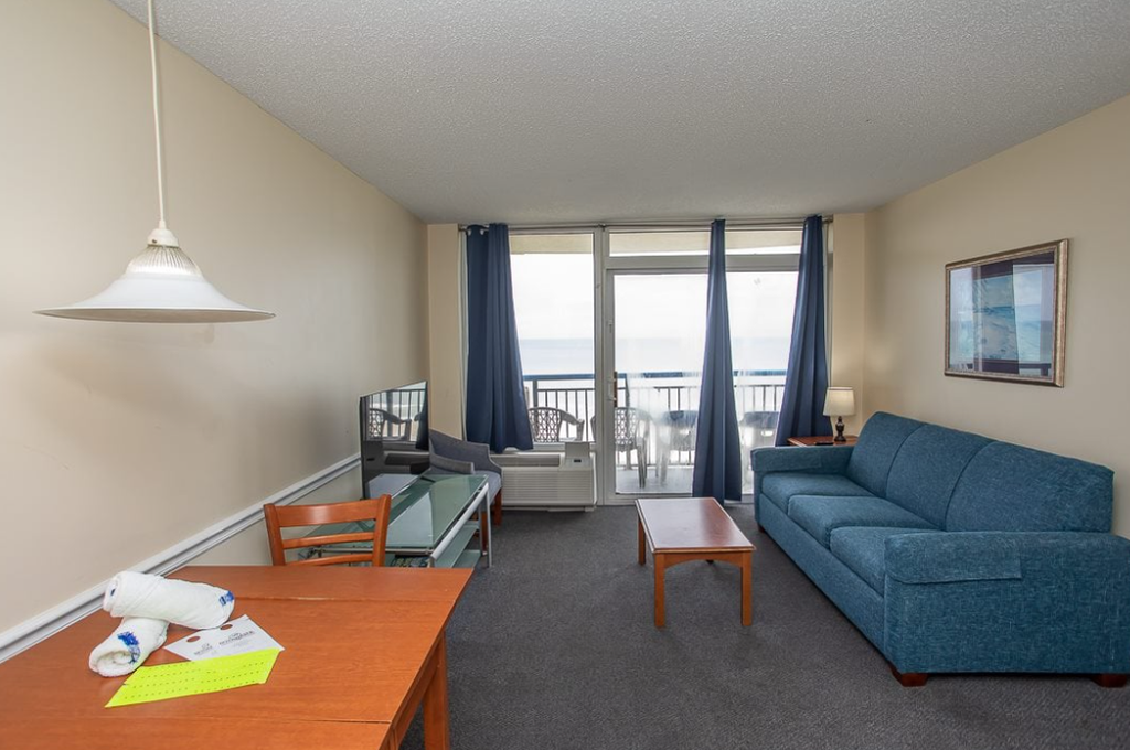 Check out this direct oceanfront vacation rental at Boardwalk Resort in Myrtle Beach, SC. This oceanfront vacation rental is fully furnished with everything you need for your next vacation. This 2 bedroom apartment features 1 king bed, 2 full beds, 1 full-size wall bed, a sleeper sofa, and will comfortably accommodate 10 guests. This rental is a true 2-bedroom condo, and our guests enjoy the separation between rooms and the privacy that is offered.