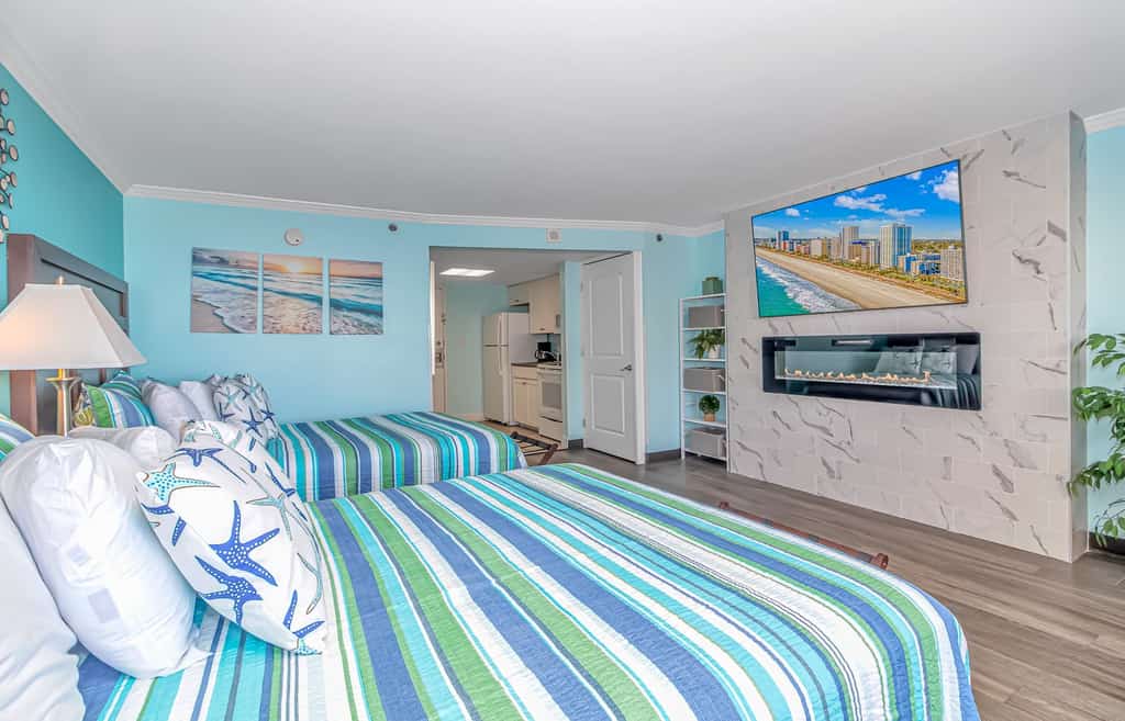 Located at the Caravelle Resort in Myrtle Beach, this condo offers great ocean views of the Atlantic Ocean. This 5th floor unit has been nicely updated! Fresh paint on all walls, new flooring, brand new mattresses and bed frames, new dressers, tiled wall with LED fireplace, 65 inch TV, full size appliances, new cabinets, new toilet and vanity, and so much more! Guests can enjoy the luxury of having a fully-stocked kitchen, making it convenient for cooking small meals. The layout is perfect and is fully furnished with 2 queen beds, sofa, dining table and chairs, and more! This arrangement will comfortably accommodate a total of 4 guests!