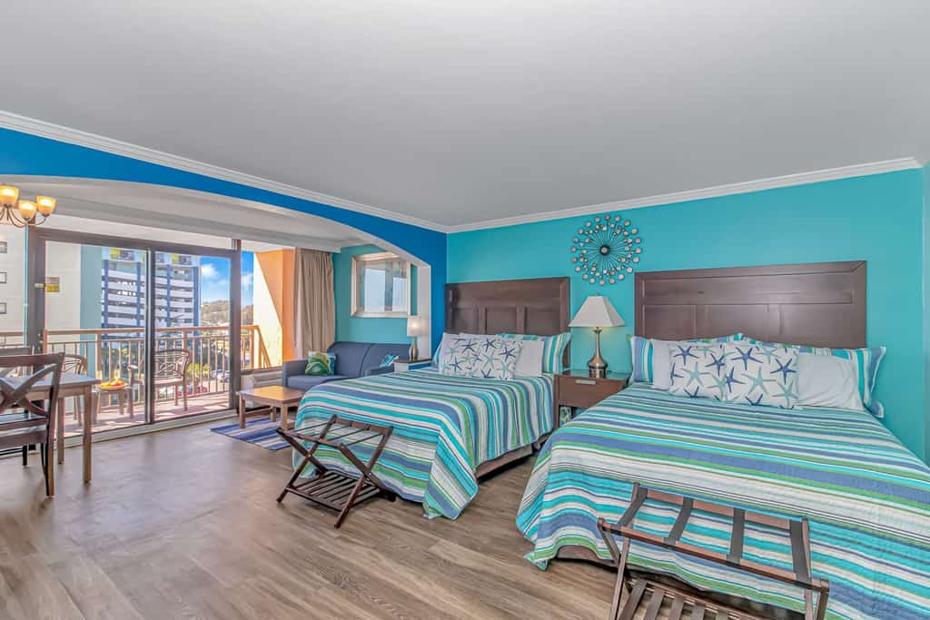 Located at the Caravelle Resort in Myrtle Beach, this condo offers great ocean views of the Atlantic Ocean. This 5th floor unit has been nicely updated! Fresh paint on all walls, new flooring, brand new mattresses and bed frames, new dressers, tiled wall with LED fireplace, 65 inch TV, full size appliances, new cabinets, new toilet and vanity, and so much more! Guests can enjoy the luxury of having a fully-stocked kitchen, making it convenient for cooking small meals. The layout is perfect and is fully furnished with 2 queen beds, sofa, dining table and chairs, and more! This arrangement will comfortably accommodate a total of 4 guests!