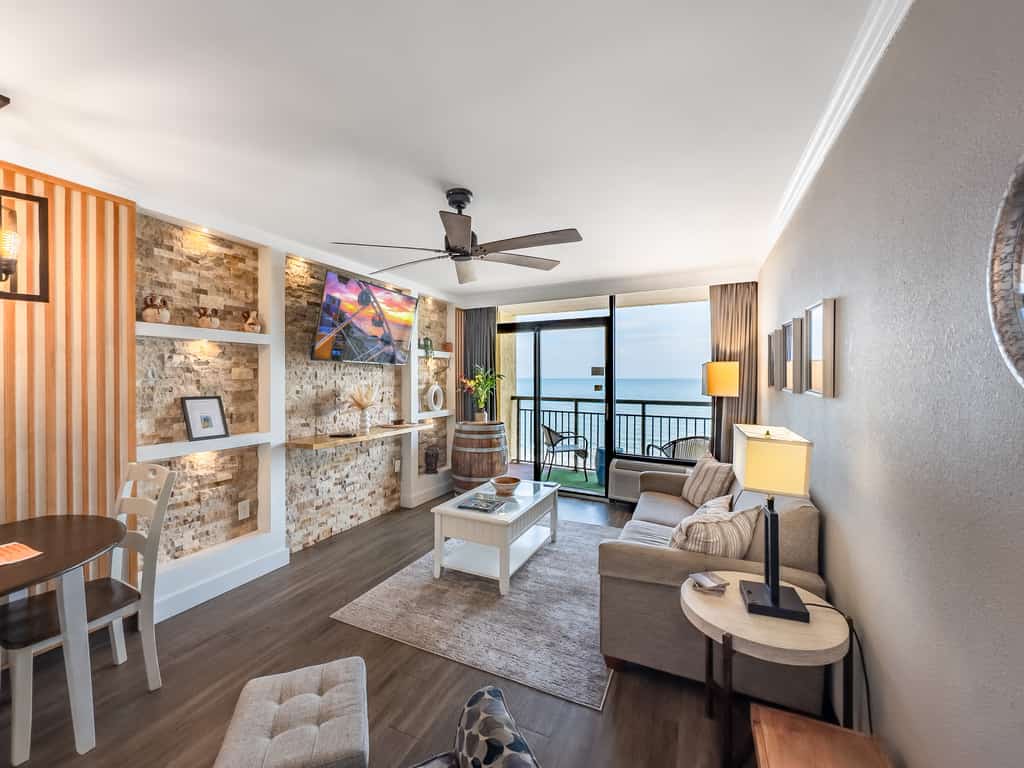 Check out this truly unique and beautifully renovated oceanfront one-bedroom condo at Caravelle Resort. This coastal escape is thoughtfully designed with comfort in mind, featuring two queen beds in the bedroom, along with a sleeper sofa and a Murphy bed in the living area, comfortably accommodating up to eight guests.