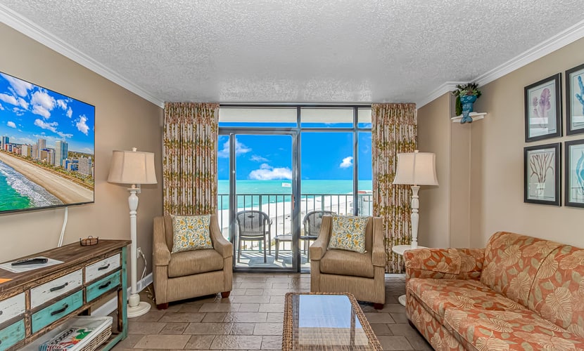 Check out this adorable one bedroom oceanview condo perched on the 10th floor of the Sand Dunes Resort. This peaceful beach getaway features one queen bed and one full bed, comfortably accommodating up to four guests and providing the perfect place to relax after a day by the ocean.