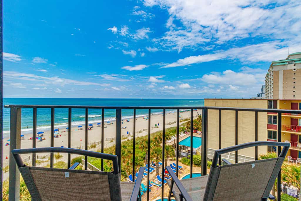 This fourth-floor studio welcomes you with a sweeping view of the ocean and pool, an instant reminder that you&rsquo;ve arrived at your very own slice of Myrtle Beach paradise. Sunlight fills the space, reflecting off the water below and setting the tone for slow mornings, salty breezes, and carefree days. Whether you're planning a romantic escape or a peaceful retreat for two, this cozy studio offers the perfect balance of comfort and charm. With a queen bed and a full-size sleeper sofa, it can easily accommodate up to four guests when needed, without ever losing its intimate feel.