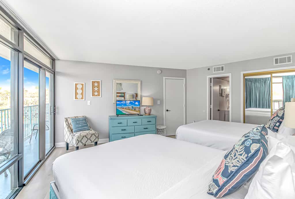 If you are looking for your next vacation spot in Myrtle Beach, SC, the search ends here! You will be blown away by this recently renovated, spacious 2-bedroom condo, located at the highly sought-after complex of Sand Dunes Resort in Myrtle Beach, SC. This ocean view condo features 2 queen size beds, 2 full size beds and will comfortably accommodate up to 8 guests! Guests will have access to multiple dressers and closets for storage, TV in each room, complimentary Wi-Fi, 2 private bathrooms, vanity, and a fully functioning kitchen. In addition to the cozy, coastal decor, this condo has its own private balcony with partial ocean views!


Important Notice: Balcony Railing Coating Project

The Balcony Railing Coating Project will be underway for approximately 6&ndash;8 weeks (weather permitting), with completion expected by mid to late January.

During this period, signage will be placed on sliding glass doors to inform guests when balcony work is taking place. Please remind guests not to touch the railings, as they will be in various stages of coating and drying.

Please note:

Balcony access will be restricted only while work is being performed on that specific stack.
