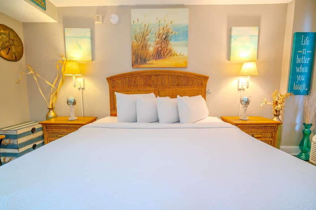 The search for your next vacation stops here! Check out this 12th floor, direct ocean front condo at the Landmark Resort in Myrtle Beach. This oceanfront 1 bedroom condo is fully furnished with 1 king bed, 1 full size murphy bed, and will comfortably accommodate 4 guests. This unique layout offers oversized living space for our guests. Other rentals at the resort are much smaller, but this layout features an open floor plan and doesn't feel cramped! Our guests enjoy having their own private balcony where they can relax and enjoy both the views of the ocean as well as the pools.