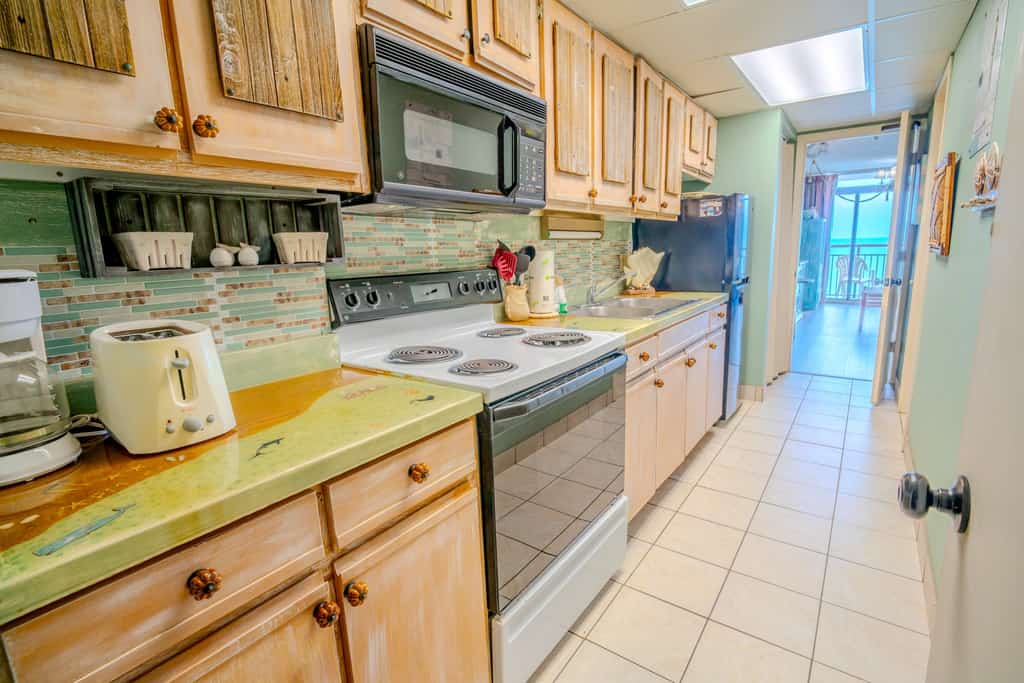 The search for your next vacation stops here! Check out this 12th floor, direct ocean front condo at the Landmark Resort in Myrtle Beach. This oceanfront 1 bedroom condo is fully furnished with 1 king bed, 1 full size murphy bed, and will comfortably accommodate 4 guests. This unique layout offers oversized living space for our guests. Other rentals at the resort are much smaller, but this layout features an open floor plan and doesn't feel cramped! Our guests enjoy having their own private balcony where they can relax and enjoy both the views of the ocean as well as the pools.