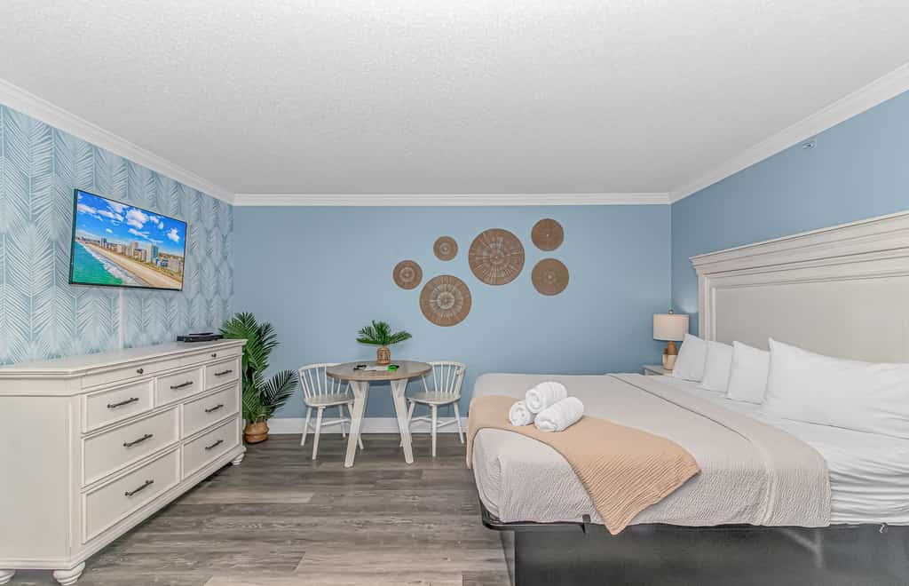 Check out this recently remodeled studio on the 5th floor of the Paradise Resort. This inviting ocean view getaway comfortably sleeps up to four guests and features one king bed and a sleeper sofa, creating a stylish and comfortable space for your Myrtle Beach vacation.