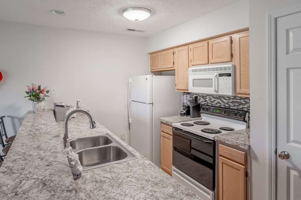 Check out this charming one of a kind one bedroom course front River Oaks condo for four. This warm and inviting getaway features a cozy queen bed and a comfortable queen sized sleeper sofa, offering all the familiar comforts of home while placing you just steps from the golf course and only a short drive from the beach. It is the perfect blend of relaxation and convenience wrapped in a peaceful setting.