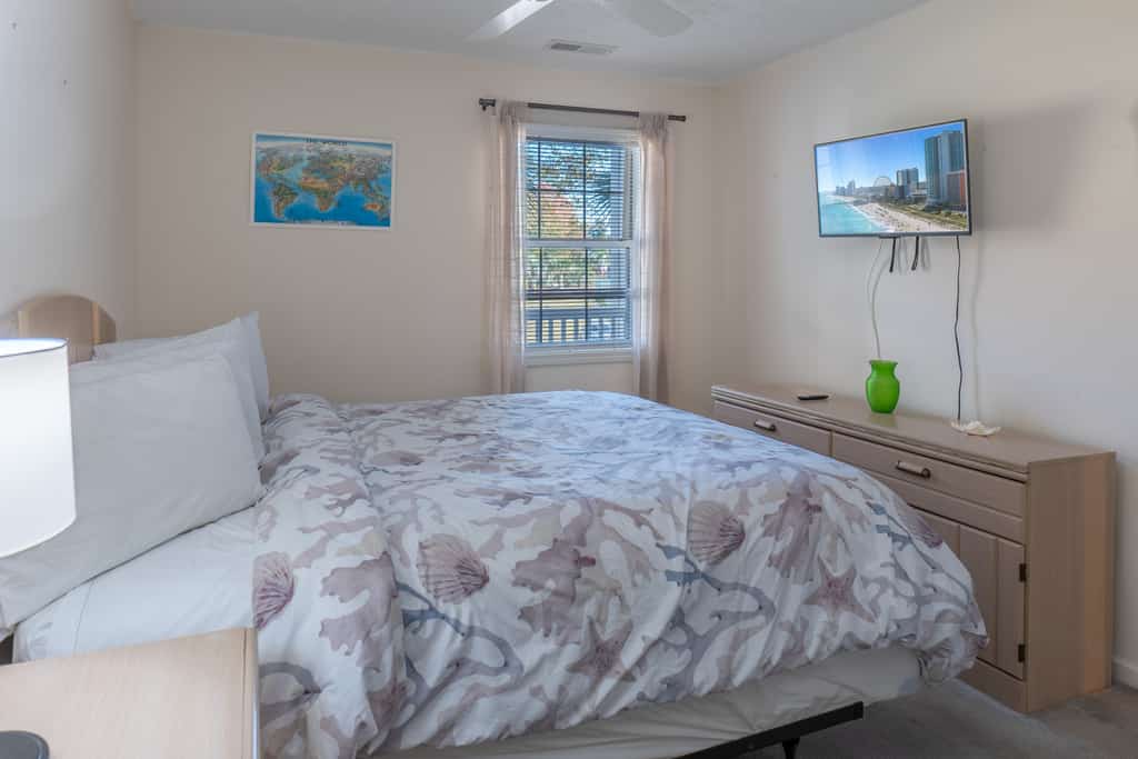 Check out this charming one of a kind one bedroom course front River Oaks condo for four. This warm and inviting getaway features a cozy queen bed and a comfortable queen sized sleeper sofa, offering all the familiar comforts of home while placing you just steps from the golf course and only a short drive from the beach. It is the perfect blend of relaxation and convenience wrapped in a peaceful setting.
