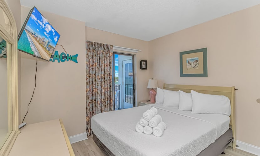 Check out this one of a kind one bedroom suite located on the 8th floor of the The Palace Resort. With beautiful ocean views, a queen sized bed, and a queen sleeper sofa, this inviting retreat comfortably accommodates up to 4 guests while offering the perfect mix of comfort and coastal charm in Myrtle Beach.