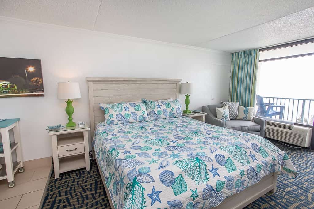 If you're looking for an updated vacation rental, perfect for 2 guests, look no further! Check out this 4th floor king suite at the Sand Dunes Resort in Myrtle Beach, SC. This ocean front studio is fully furnished with 1 king bed, accent chair, dresser and closet for storage, dining table and chairs, TV with basic cable, resort wifi, private bathroom with tub/shower and vanity, fridge, kitchen sink, and more! The space is perfect for a couple's getaway!


Important Notice: Balcony Railing Coating Project

The Balcony Railing Coating Project will be underway for approximately 6&ndash;8 weeks (weather permitting), with completion expected by mid to late January.

During this period, signage will be placed on sliding glass doors to inform guests when balcony work is taking place. Please remind guests not to touch the railings, as they will be in various stages of coating and drying.

Please note:

Balcony access will be restricted only while work is being performed on that specific stack.