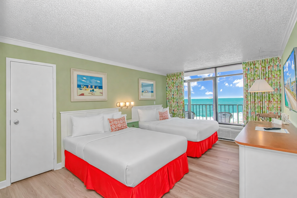 Take a look at this cozy oceanview studio located on the 10th floor of the Sand Dunes Resort. Featuring one queen bed and one full sized bed, this charming condo comfortably accommodates up to four guests and offers a relaxed space to unwind after a day by the beach.