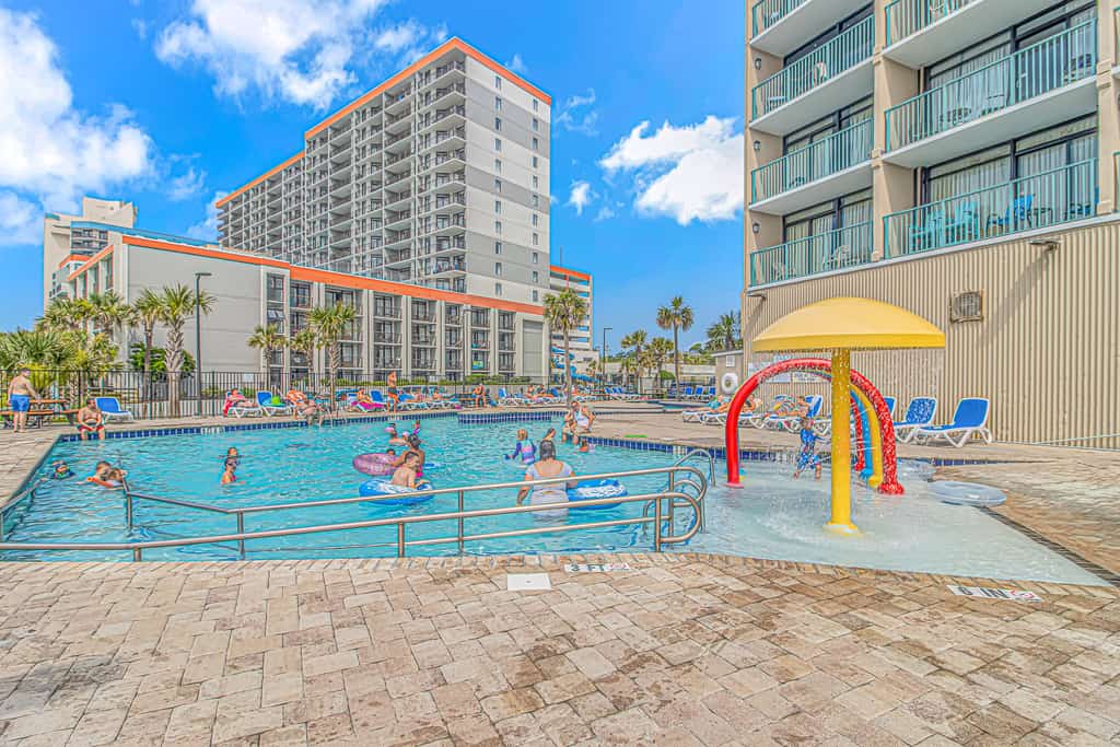 Take a look at this cozy oceanview studio located on the 10th floor of the Sand Dunes Resort. Featuring one queen bed and one full sized bed, this charming condo comfortably accommodates up to four guests and offers a relaxed space to unwind after a day by the beach.