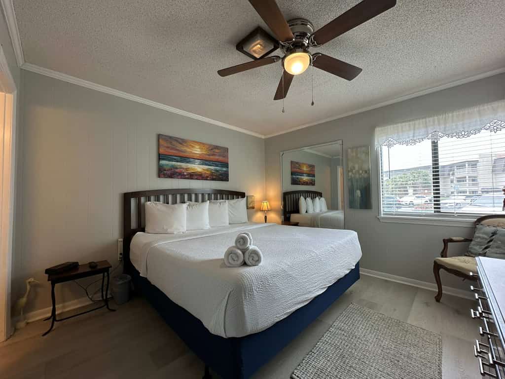Take a peek at this charming 2 bedroom condo located in the quiet community of Ocean Forest Villas! Equipped with a queen sized bed, a full bed, and a twin over twin bunk bed, this cozy condo can comfortably accommodate a total of 6 guests. Located on the first floor of the building, no stairs or elevators are required!