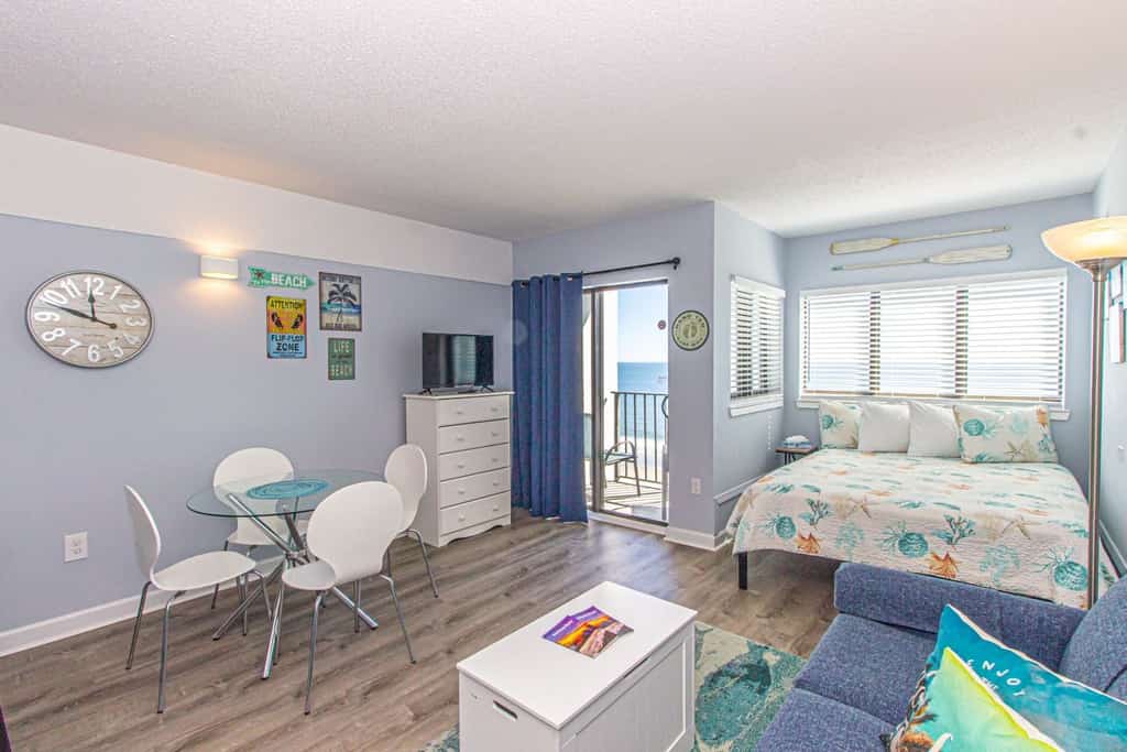 The search for your next vacation stops here! Check out this 6th floor, fully updated, studio apartment at The Palace Resort in Myrtle Beach. This oceanfront condo is fully furnished with 1 queen-size bed and 1 queen size sleeper sofa. The layout of this rental will comfortably accommodate 4 guests.

This unique layout offers ample living space for our guests. Other rentals at the resort are much smaller, but this layout features an open floor plan and doesn't feel cramped. This studio offers fresh paint as of Spring 2021, beachy decor, modern furniture, laminate floors, and endless views of the Atlantic Ocean!