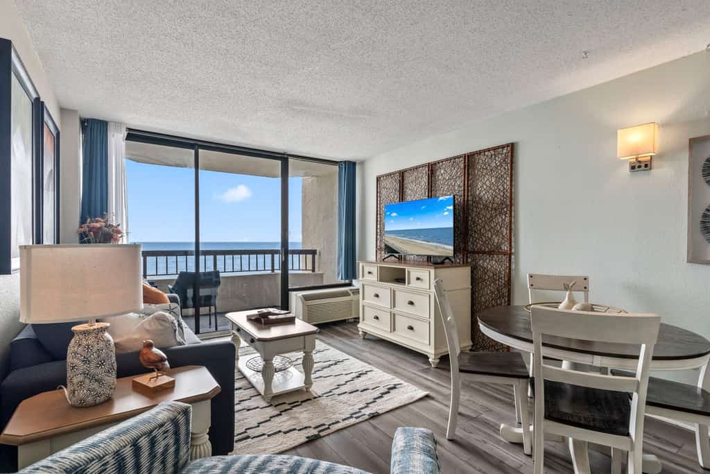 Located at the beautiful Pinnacle Oceanfront Tower Resort in Myrtle Beach, this stunning 1-bedroom suite offers front-row views of the Atlantic that will instantly put you in vacation mode. Perched perfectly on the 7th floor, the condo feels bright, open, and thoughtfully designed, complete with 2 queen beds, a sleeper sofa, and a queen-sized Murphy bed, giving up to 8 guests plenty of space to relax without ever feeling cramped.