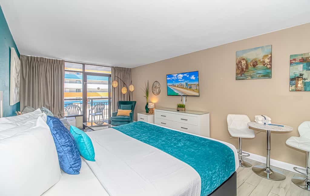 The search for your next vacation stops here! Check out this 7th floor condo at the Landmark in Myrtle Beach. This beautifully updated suite is fully furnished with 1 king bed, and will comfortably accommodate 2 guests. As of Spring 2023, this vacation rental has been updated with new paint, new modern furniture, new lvp flooring throughout, and new modern decor. Our guests enjoy having their own private balcony where they can relax and enjoy the fresh air and views of the interior courtyard.