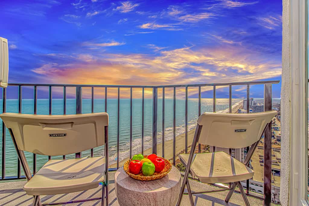 Your perfect getaway starts here! This stunning 2-bedroom, 2-bathroom condo on the 23rd floor offers breathtaking views of the Atlantic Ocean and the city skyline, making it the ultimate spot to unwind and soak in the scenery. Recently renovated from top to bottom, this unit blends modern luxury with comfort, featuring sleek granite countertops, stainless steel appliances, and contemporary furniture throughout.