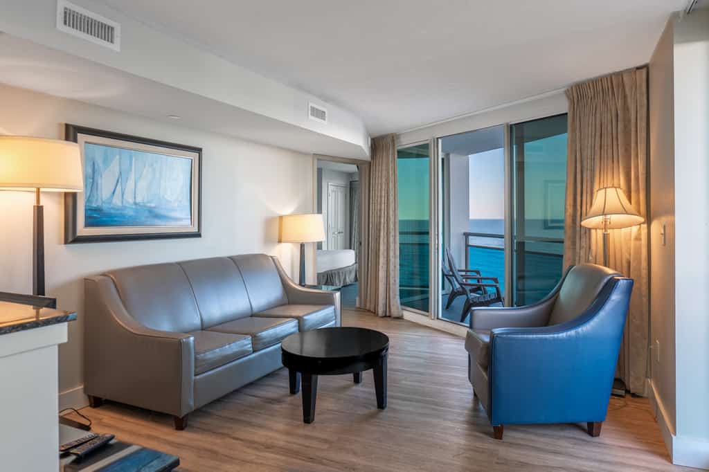 Welcome to your coastal escape in the sky, a beautifully refreshed 2-bedroom, 2-bathroom ocean view condo perched on the 10th floor, where floor-to-ceiling windows frame the sparkling shoreline and fill the space with endless natural light. This elegant retreat comfortably accommodates up to six guests and offers the perfect blend of comfort, style, and breathtaking scenery.