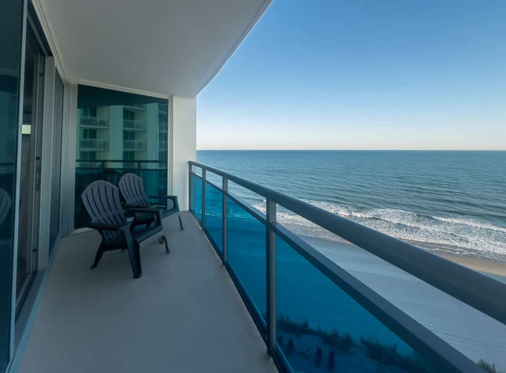 Welcome to your coastal escape in the sky, a beautifully refreshed 2-bedroom, 2-bathroom ocean view condo perched on the 10th floor, where floor-to-ceiling windows frame the sparkling shoreline and fill the space with endless natural light. This elegant retreat comfortably accommodates up to six guests and offers the perfect blend of comfort, style, and breathtaking scenery.