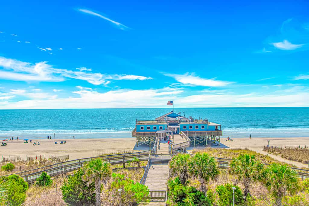 Welcome to your tropical escape at Bamboo Beachfront Bungalow, a beautifully updated oceanfront studio located on the 5th floor of the iconic Yachtsman Resort South Tower. Designed with a breezy, island inspired feel, this inviting space features a queen sized bed and a sleeper sofa, comfortably accommodating up to 4 guests for the perfect coastal getaway in Myrtle Beach.