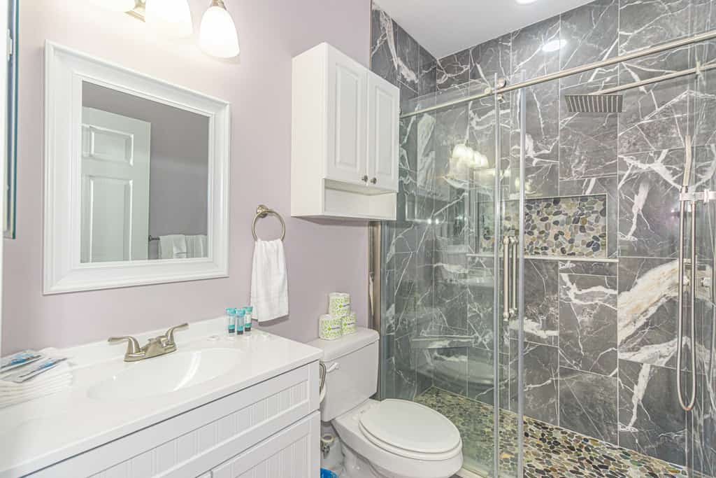 Your next vacation starts here! Nestled in the heart of Myrtle Beach, this charming second-floor condo at Magnolia Pointe is the perfect getaway. With three cozy bedrooms, this fully furnished condo comfortably sleeps up to six guests. You&rsquo;ll find two queen-sized beds, two twin-sized beds, and plenty of space to unwind. The spacious living area boasts a large L-shaped sectional, an accent chair, a sleek wall-mounted TV, a coffee table, and stunning views of the lush golf course right from the private balcony, an ideal spot to relax and enjoy the scenery.