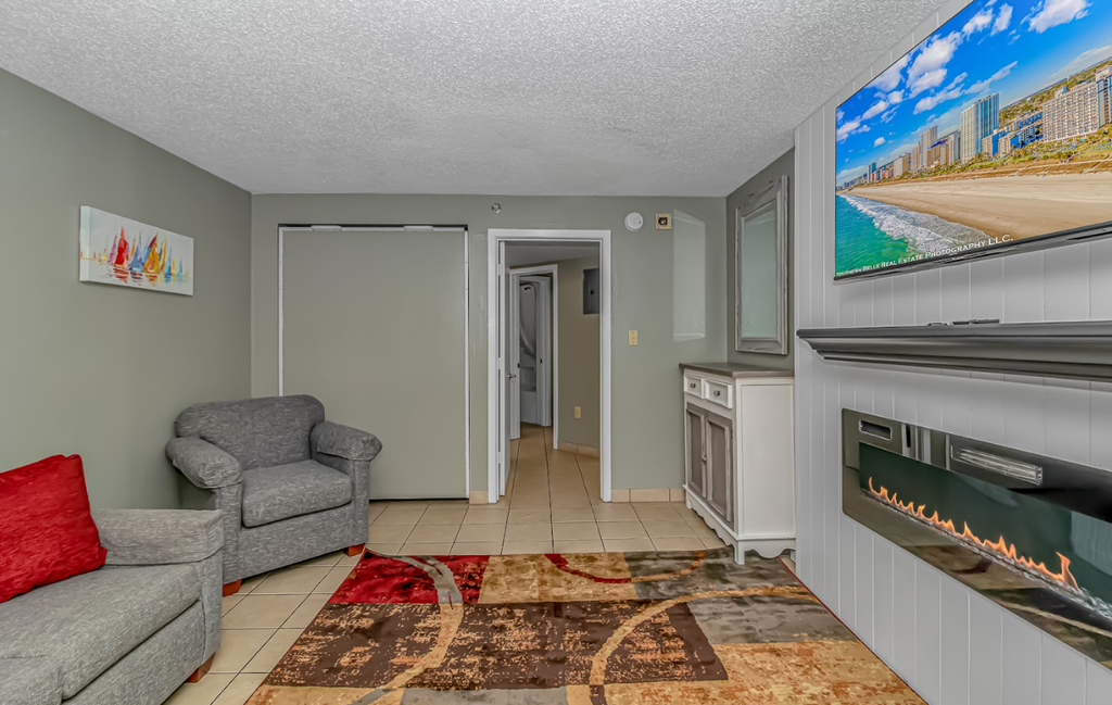 The search for your next vacation stops here! Check out this 3rd floor, completely updated, ocean view condo at the Landmark Resort in Myrtle Beach. This ocean view 1 bedroom apartment is fully furnished with 1 king bed, 1 full size murphy bed, 1 queen sleeper sofa, and will comfortably accommodate 6 guests. This unique layout offers oversized living space for our guests. Other rentals at the resort are much smaller, but this layout features an open floor plan and doesn't feel cramped! Our guests enjoy having their own private balcony where they can relax and enjoy both the views of the ocean as well as the pools.