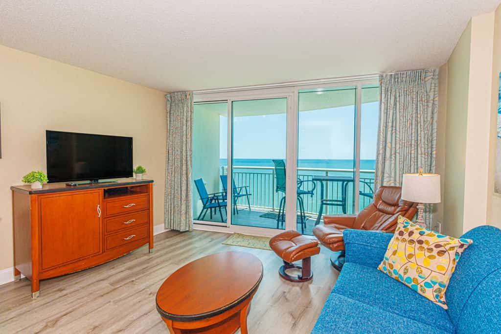 Check out this 16th floor oceanfront vacation rental at Sandy Beach Resort in Myrtle Beach, SC. This oceanfront vacation rental is fully furnished with everything you need for your next vacation. This apartment features 2 queen beds, and 1 full-size murphy bed, and will comfortably accommodate 6 guests. This rental is a 1-bedroom condo which allows for privacy and separation from the main living space and sleeping area. This condo offers a private balcony with endless views of the Atlantic Ocean.