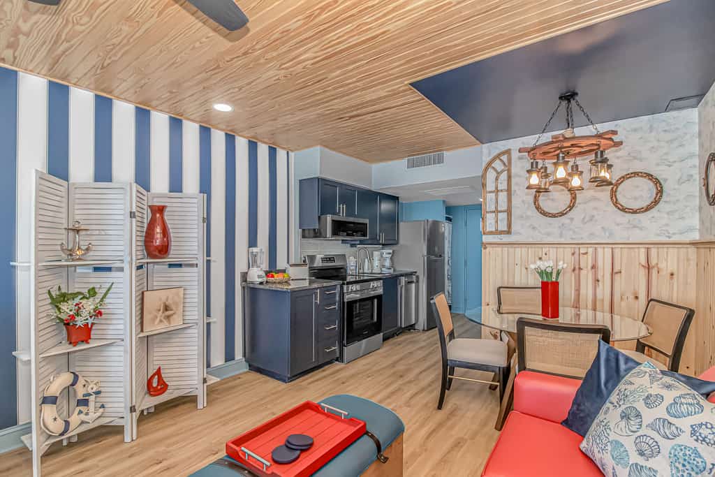Welcome to the Nautical Nest! This beautifully renovated oceanfront studio is perched on the 5th floor of the iconic Yachtsman Resort South Tower, placing you right in the heart of Myrtle Beach. Just steps from the lively Myrtle Beach Boardwalk and within walking distance to favorites like the Myrtle Beach SkyWheel, this stylish retreat is the perfect spot for up to 4 guests to relax, explore, and make unforgettable beach memories.
 
Guests staying in 503B will enjoy a thoughtfully updated kitchen featuring brand new stainless steel appliances, including a refrigerator, stove and oven, dishwasher, sink, and microwave. Smaller essentials like a toaster and coffee maker are also provided for your convenience. The space is finished with sleek granite countertops and new cabinetry, offering plenty of room for groceries and easy meal prep. If you prefer to dine out, you are surrounded by some of the area’s most popular restaurants, and delivery services like Uber Eats and DoorDash make enjoying a meal in just as simple.