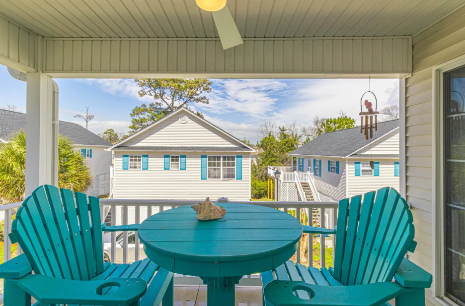 Welcome to The Mayflower, a beautifully furnished raised beach home that perfectly captures the effortless luxury and charm of Myrtle Beach living. Nestled in the sought-after Shore Drive section, this stunning three-bedroom, two-bath coastal escape blends modern comfort with breezy seaside style, just a short stroll from the beach and close to the area's best dining, entertainment, and attractions.
