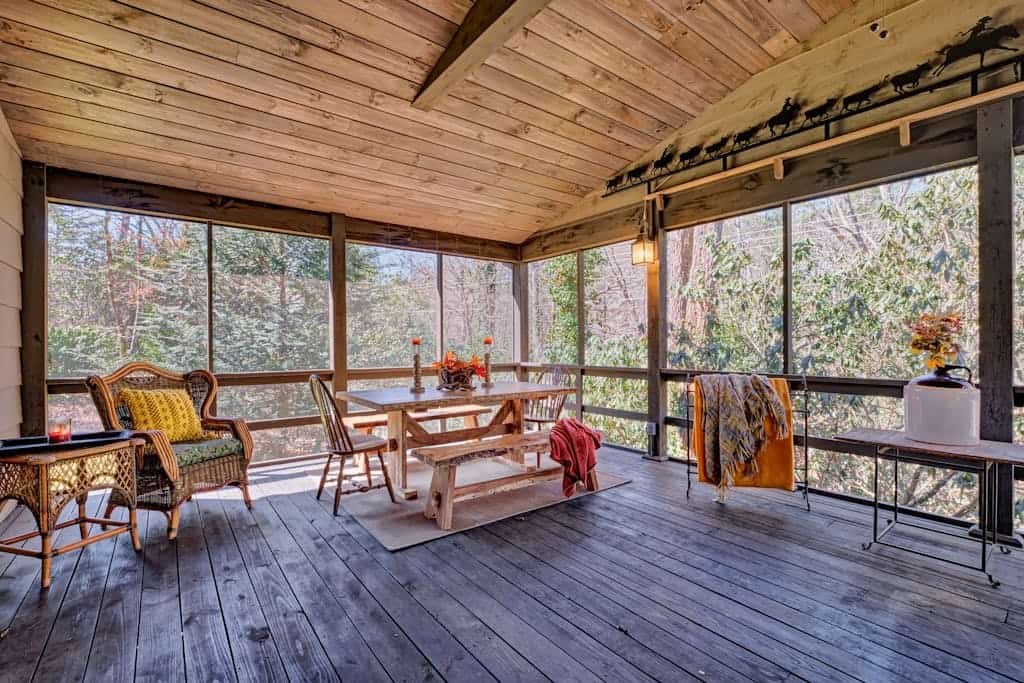 Gorgeous cabin on 2 wooded acres with furnished sunroom and washer/dryer