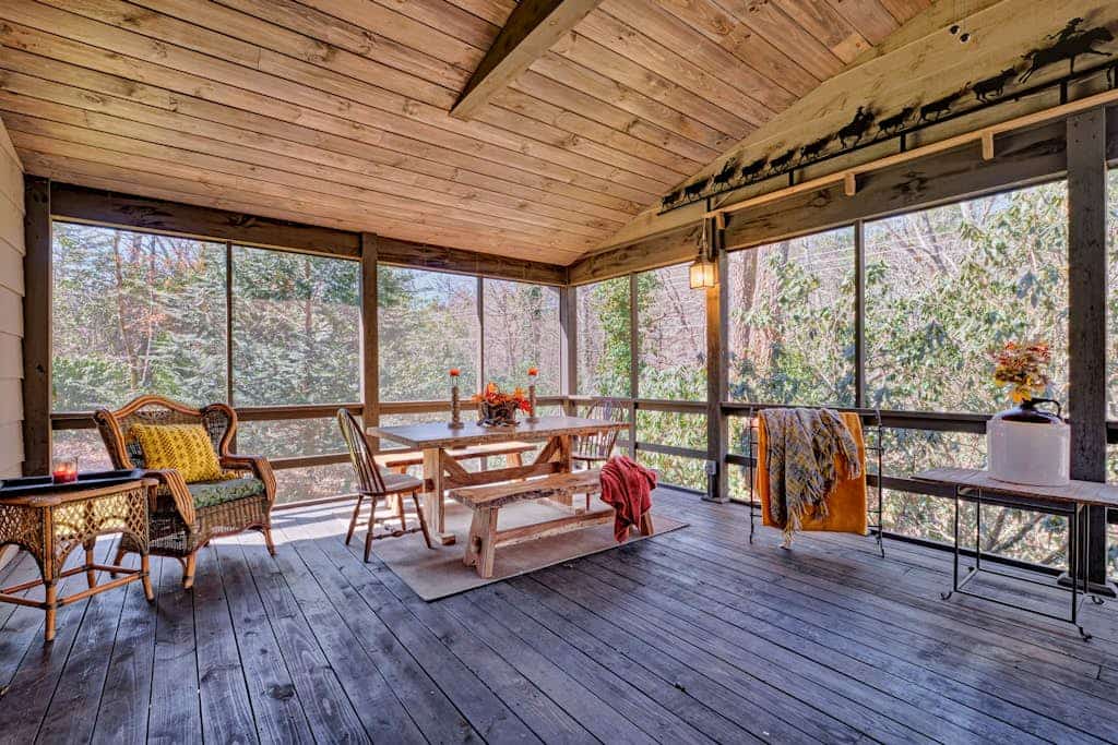 Gorgeous cabin on 2 wooded acres with furnished sunroom and washer/dryer