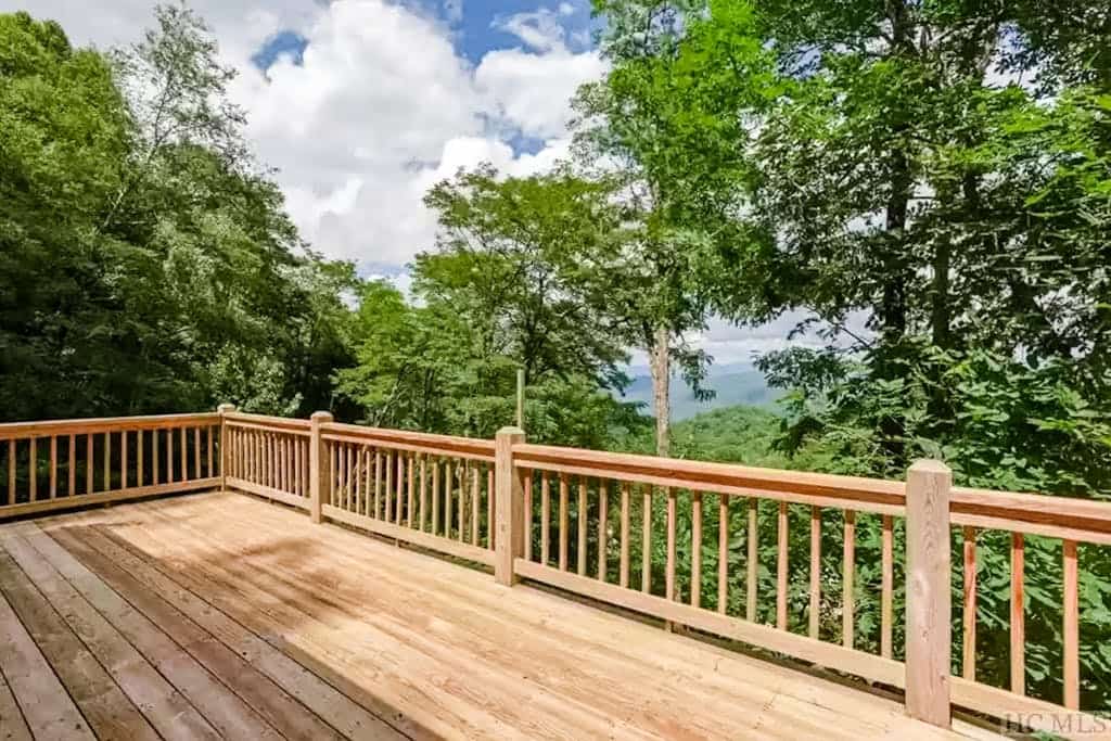 Elevated mountain-view cabin with private hot tub, 2 decks, firepit, & grill